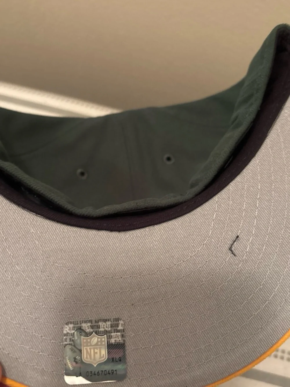 NFL New Era Green and Gold Fitted Cap with Embroidered Football Logo